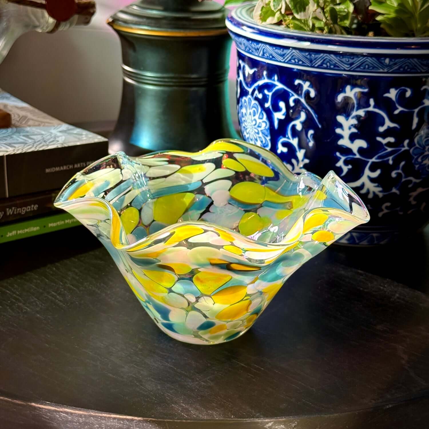 Buttercup glass vase featuring a colorful design with yellow and blue tones, part of the Lacey Collection.