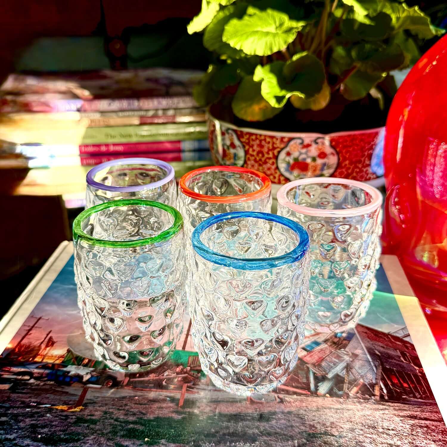 Handmade Glass Ornament Love Cups with colorful rims, showcasing a unique heart design, perfect for any beverage.
